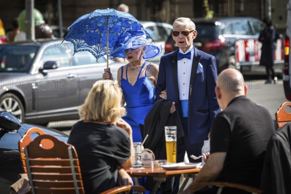 DEU Germany Germany Berlin An elderly couple in luxury clothing on their way to the opera