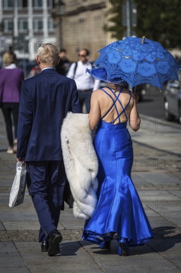DEU Germany Germany Berlin An elderly couple in luxury clothing on their way to the opera