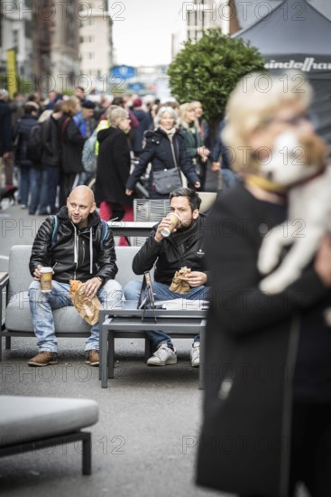 DEU Germany Germany Berlin Part of Friedrichsstrasse is closed to traffic at the weekend. Pedestrians use the street for a stroll or to sit on a sofa