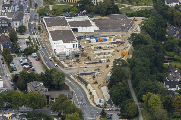 Aerial view, construction site new building at Hefelmann-Park, shopping centre, Westfalenstraße, former Kiekert site, Heiligenhaus, Ruhr area, North Rhine-Westphalia, Germany, Am Hefelmann-Park, construction work, construction, construction area, building site, building plots, construction measure, construction project, construction site, DE, Europe, aerial view, aerial photography, aerial photography, new building, panorama cycle path, overview, bird's-eye view, overview, local supply centre, former foundry Hitzbleck