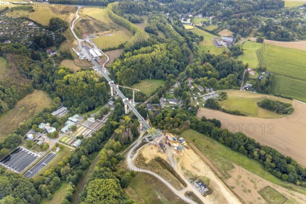 Aerial view, construction site, new construction bridge Angerbach, sewage treatment plant Angertal, motorway A44, Heiligenhaus, Ruhr area, North Rhine-Westphalia, Germany, construction work, construction, construction area, construction site, building plots, construction crane, construction project, construction site, bridge, DE, Europe, Hofermühle, aerial view, aerial photography, aerial photography, gap closure of the A44, new construction, overview, bird's-eye view, overview