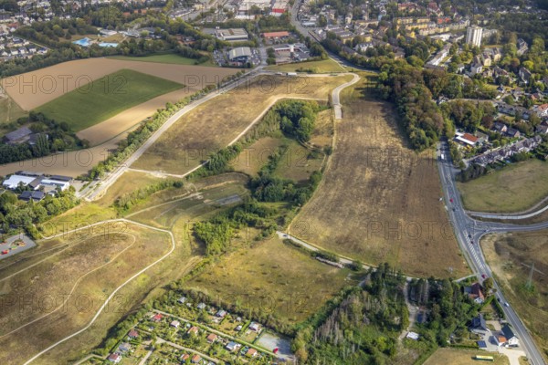 Aerial view, green area at Friedhofsallee, construction site new motorway A44, Ratinger Straße, Heiligenhaus, Ruhr area, North Rhine-Westphalia, Germany, motorway A44, construction work, construction, construction area, building site, building plots, construction project, construction site, DE, Europe, aerial view, aerial photography, aerial photography, gap closure of the A44, new construction, road construction, overview, bird's eye view, meadows and fields, birds-eyes view, overview