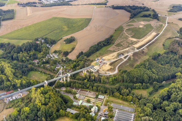Aerial view, construction site, new construction bridge Angerbach, sewage treatment plant Angertal, motorway A44, Heiligenhaus, Ruhr area, North Rhine-Westphalia, Germany, construction work, construction, construction area, construction site, building plots, construction crane, construction project, construction site, bridge, DE, Europe, Hofermühle, aerial view, aerial photography, aerial photography, gap closure of the A44, new construction, overview, bird's-eye view, overview