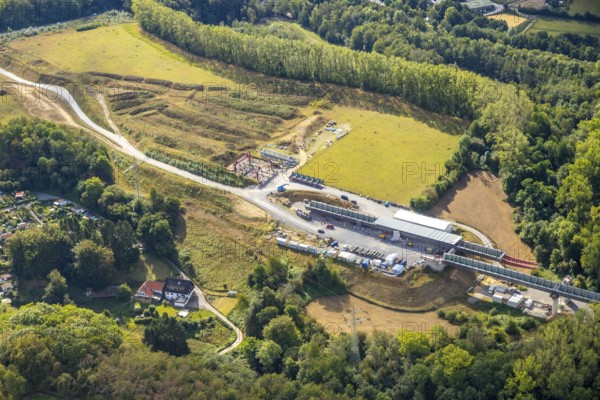 Aerial view, construction site, new construction bridge Angerbach, motorway A44, Heiligenhaus, Ruhr area, North Rhine-Westphalia, Germany, construction work, construction, construction area, construction site, building plots, construction crane, construction project, construction site, bridge, DE, Europe, distant view, Hofermühle, aerial view, aerial photography, aerial photography, gap closure of the A44, new construction, overview, bird's eye view, meadows and fields, birds-eyes view, overview