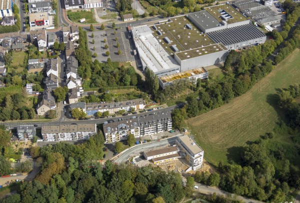 Aerial view, construction site, new multi-family house with day care centre, Elisabeth-Selbert-Straße, Kurt-Schumacher-Straße, Heiligenhaus, Ruhr area, North Rhine-Westphalia, Germany, construction work, building, construction area, building site, building plots, construction project, construction site, DE, Europe, property tax, real estate, kindergarten, day nursery, day care centre, day care centre, aerial view, aerial photography, aerial photography, new building, overview, bird's eye view, WSS, Wilhelm Schlechtendahl & Söhne GmbH, residential complex, housing and living, residential area, residential buildings, residential quality, residential quarter, housing estate, birds-eyes view, overview