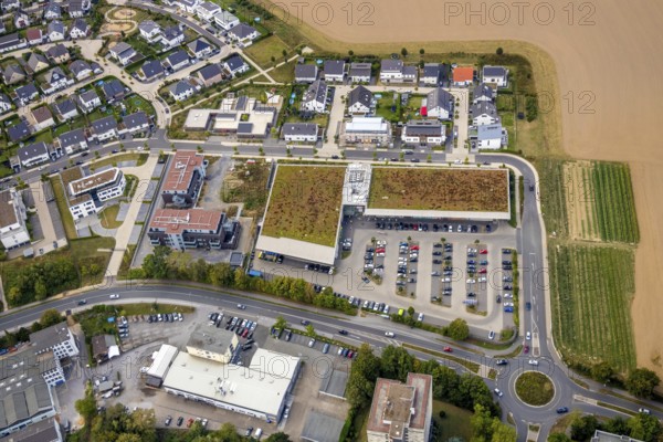 Aerial view, commercial area Höseler Straße, Rügenstraße, residential area Hunsrückstraße, HeljensBad, Inselsiedlung, Heiligenhaus, Ruhr area, North Rhine-Westphalia, Germany, Aldi supermarket, bathing establishment, bathing resort, DE, shopping, shopping place, shopping centre, Europe, leisure, commercial enterprises, commercial area, commercial area, commercial park, commercial location, commercial use, property tax, indoor swimming pool, high-rise buildings, real estate, industrial area, industrial location, aerial view, aerial photography, aerial photography, local supply centre, pool, Rewe supermarket, swimming pool, swimming pool, supermarket, overview, bird's-eye view, residential area, housing and living, residential area, residential buildings, residential quality, residential quarter, housing estate, birds-eyes view, overview