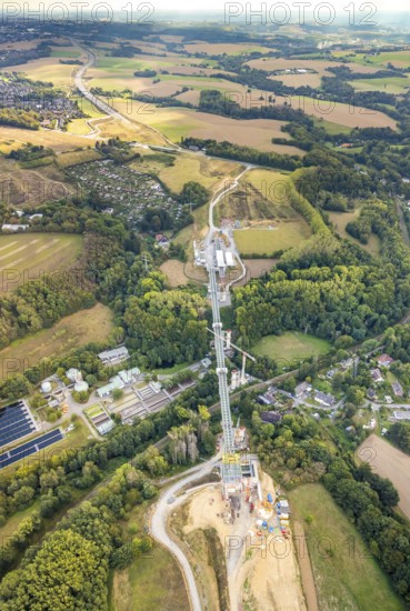 Aerial view, construction site, new construction bridge Angerbach, sewage treatment plant Angertal, motorway A44, Heiligenhaus, Ruhr area, North Rhine-Westphalia, Germany, construction work, construction, construction area, construction site, building plots, construction crane, construction project, construction site, bridge, DE, Europe, distant view, Hofermühle, aerial view, aerial photography, aerial photography, gap closure of the A44, new construction, overview, bird's eye view, meadows and fields, birds-eyes view, overview