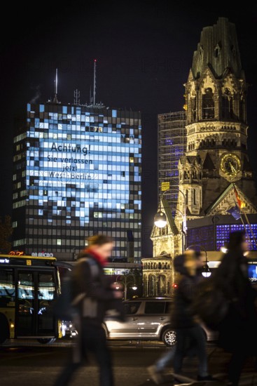DEU Germany Germany Berlin Light projections and art installations for the 30th anniversary of the fall of the Berlin Wall on 9 Nov. 1989. projection on the Europacenter am Tauenzien