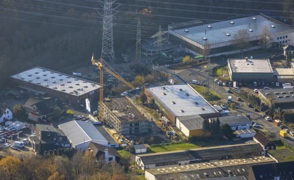 Aerial photo, construction site, construction crane, new building, electricity pylons, Gahlenfeldstraße, Ostend, Herdecke, Ruhr area, North Rhine-Westphalia, Germany, DE, Europe, birds-eyes, view, aerial photo, aerial photography, aerial photography, overview, overview, bird's eye view, power supply, energy, high voltage, energy supply