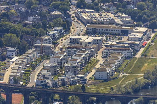 Aerial view, Quartier Ruhr-Aue Center, Ruhrpromenade, Herdecke, Ruhr area, North Rhine-Westphalia, Germany, DE, shopping centre, shopping markets, shopping place, shopping mall, Europe, river Ruhr, commercial buildings, property tax, real estate, aerial view, aerial photography, aerial photography, local supply centre, Quartier Ruhr-Aue, overview, bird's eye view, living and working, living and life, residential area, residential buildings, quality of living, residential quarter, birds-eyes view, overview
