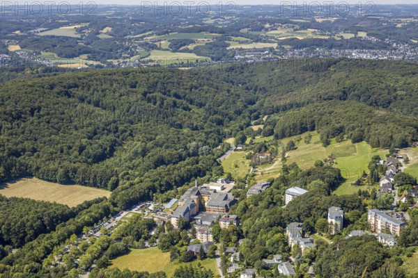 Aerial view, forest area with distant view, Community Hospital Herdecke, Waldorfkindergarten Herdecke, Herdecke, Ruhr area, North Rhine-Westphalia, Germany, General Hospital, DE, Europe, distant view, GKH Herdecke, Gerhard-Kienle-Weg, health care, property tax, green trees, high-rise buildings, hospital, helipad, real estate, clinic, clinical centre, hospital, aerial view, aerial photography, aerial photography, medical facility, medical aid, overview, bird's eye view, living and life, residential area, residential buildings, anthroposophic medicine, birds-eyes view, holistic medicine, overview, medical care