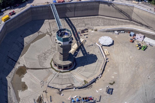 Aerial photo, RWE has completely emptied the large upper reservoir for the main inspection at the Herdecke pumped storage power plant. The plant will be off the grid for a few weeks, storage reservoir, RWE pumped storage power plant, Köpchenwerk, Herdecke, Ruhr area, North Rhine-Westphalia, Germany<, construction work, construction area, construction measure, construction project, construction site, DE, Germany, Europe, Ruhr river, Hengsteysee, aerial photograph, aerial photography, aerial photography, pumped storage power plant Köpchenwerk, RWE, lake, overview, bird's-eye view, forest area, birds-eyes view, overview