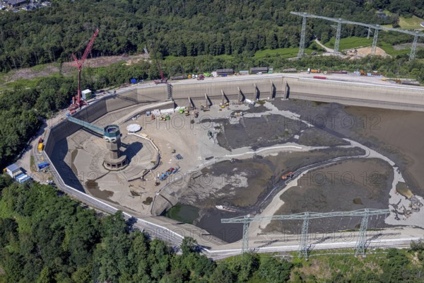 Aerial photo, RWE has completely emptied the large upper reservoir for the main inspection at the Herdecke pumped storage power plant. The plant will be off the grid for a few weeks, storage reservoir, RWE pumped storage power plant, Köpchenwerk, Herdecke, Ruhr area, North Rhine-Westphalia, Germany<, construction work, construction area, construction measure, construction project, construction site, DE, Germany, Europe, Ruhr river, Hengsteysee, aerial photograph, aerial photography, aerial photography, pumped storage power plant Köpchenwerk, RWE, lake, overview, bird's-eye view, forest area, birds-eyes view, overview