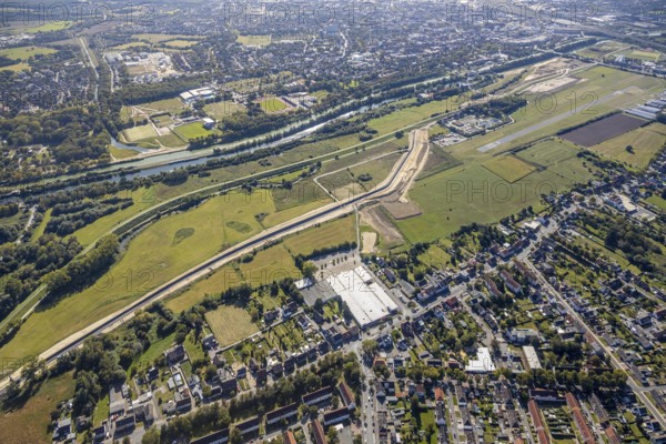 Aerial view, Hamm airfield, Mattenbecke sewage treatment plant, Lippe floodplain, Datteln-Hamm canal, River Lippe, Hamm, Ruhr area, North Rhine-Westphalia, Germany, wastewater treatment plant, wastewater treatment, construction area, construction site, building site, construction project, construction site, DE, Europe, flight emission, airport, aircraft noise, airfield, airfield site, sewage treatment plant, runway, aerial view, aerial photography, aerial photography, Münsterstrasse, runway, overview, bird's-eye view, water treatment plant, water purification plant, birds-eyes view, overview