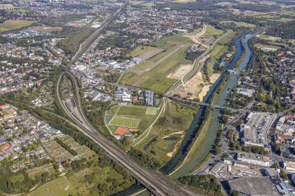 Aerial view, Hamm airfield, Mattenbecke sewage treatment plant, Lippe floodplain, Hamm lock, Lippe river, Datteln-Hamm canal, construction site, Hamm, Ruhr area, North Rhine-Westphalia, Germany, wastewater treatment plant, wastewater treatment, railway tracks, DE, Europe, flight emission, airport, aircraft noise, airfield, airfield site, sewage treatment plant, runway, aerial view, aerial photography, aerial photography, Münsterstrasse, runway, overview, bird's-eye view, water treatment plant, water purification plant, birds-eyes view, overview