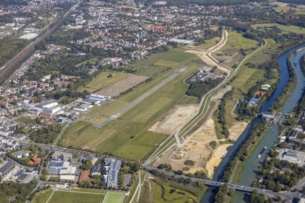 Aerial view, Hamm airfield, Mattenbecke sewage treatment plant, Lippe floodplain, Hamm lock, Lippe river, Datteln-Hamm canal, construction site, Hamm, Ruhr area, North Rhine-Westphalia, Germany, wastewater treatment plant, wastewater treatment, DE, Europe, flight emission, airport, aircraft noise, airfield, airfield site, sewage treatment plant, runway, aerial photograph, aerial photography, aerial photography, Münsterstrasse, runway, overview, bird's-eye view, water treatment plant, water purification plant, birds-eyes view, overview