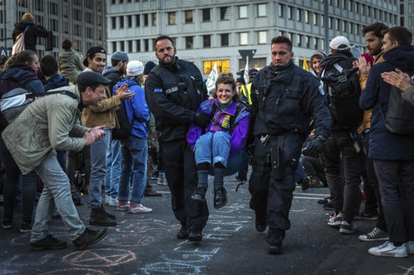 DEU Germany Germany Berlin Demonstrators of the Extinction Rebellion movement during the occupation of Potsdamer Platz.police officers clear activists of a sit-in blockade on Potsdamer Platz