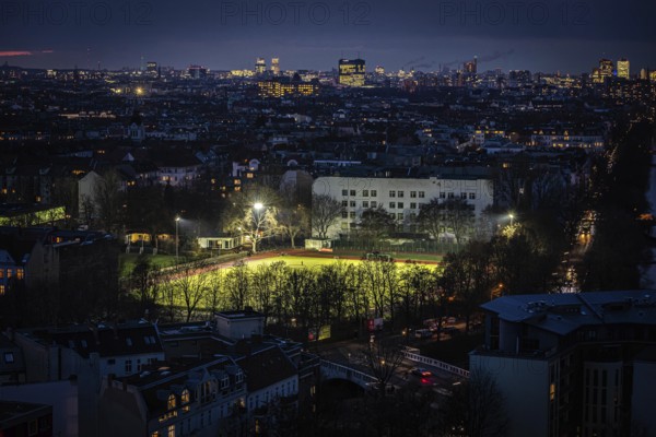 DEU Germany Germany Berlin Floodlights illuminate a sports field in Kreuzkölln