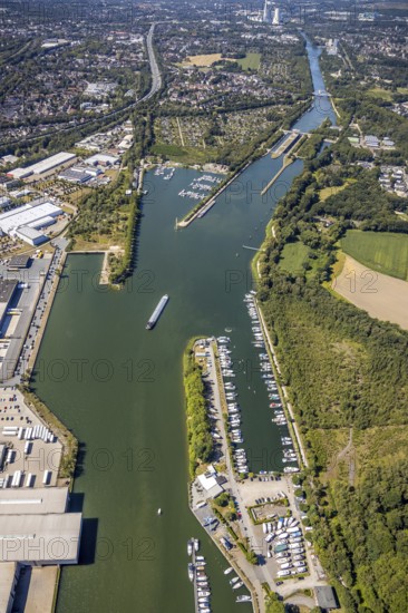 Aerial view, lock Herne-Ost, industrial estate Friedrich der Große, boats at the jetty, mooring place Automobilclub und Motorbootclub Castrop-Rauxel, Rhine-Herne-Canal, water sports club Herne 1920, Herne, Ruhr area, North Rhine-Westphalia, Germany, boats, DACHSER SE, DE, Europe, commercial enterprises, commercial area, commercial area, commercial park, commercial location, commercial use, green trees, Herner Meer, industrial plants, industrial area, industrial location, aerial view, aerial photography, aerial photography, Rhine-Ruhr metropolitan region, motorboats, swimming pool, overview, bird's-eye view, overview