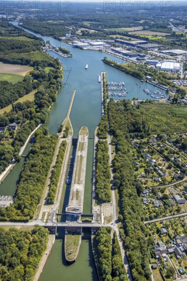 Aerial view, Herne East Lock, Friedrich der Große Industrial Estate, Boats on the jetty, Rhine-Herne Canal, Herne Water Sports Club 1920, Herne, Ruhr area, North Rhine-Westphalia, Germany, Boats, DACHSER SE, DE, Europe, Commercial enterprises, Commercial area, Industrial estate, Industrial park, commercial location, commercial use, green trees, Herne Sea, industrial plants, industrial area, industrial location, aerial view, aerial photography, aerial photography, Rhine-Ruhr metropolitan region, motorboats, swimming pool, overview, bird's-eye view, overview