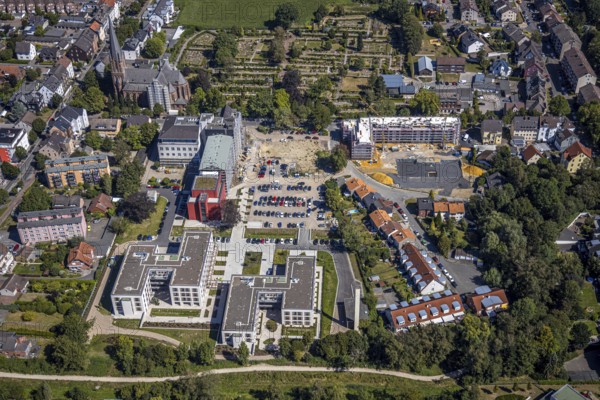 Aerial view, construction site Widumer Höfe, the future retirement home of the St Elisabeth Group, St Peter and Paul Catholic Church, Widumer Strasse Catholic Cemetery, Herne, Ruhr area, North Rhine-Westphalia, Germany. Widumer Straße cemetery, Herne, Ruhr area, North Rhine-Westphalia, Germany, retirement home, retirement home, retirement home, place of worship, construction work, construction, construction area, construction site, construction site, construction project, construction site, burial site, care and nursing, DE, Europe, cemetery, memorial site, religious community, place of worship, house of worship, crypt, graves, burial ground, church, parish, denomination, aerial view, aerial photography, aerial photography, Rhine-Ruhr metropolitan region, new building, care facility, religion, resting place, retirement home, retirement residence, retirement home, retirement centre, overview, bird's-eye view, bird's-eye view, overview