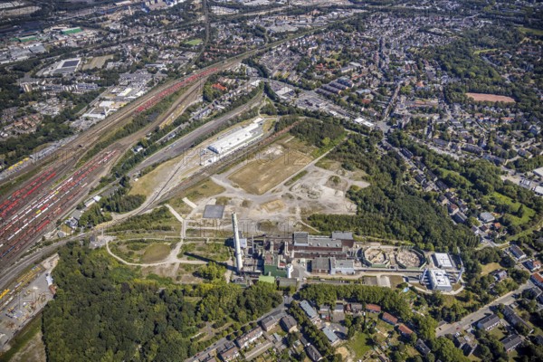 Aerial view, construction site new Stadler Schienenfahrzeuge branch, former General Blumenthal mine site, former Uniper Shamrock power plant, Herne, Ruhr area, North Rhine-Westphalia, Germany, railway tracks, DE, Europe, commercial enterprises, commercial area, commercial site, commercial use, industrial plants, industrial area, industrial site, Kastanienallee, aerial view, aerial photography, aerial photography, metropolitan region Rhine-Ruhr, signal box, overview, bird's eye view, bird's eye view, overview