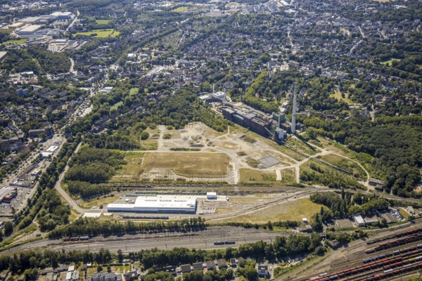 Aerial view, construction site new Stadler Schienenfahrzeuge branch, former General Blumenthal mine site, former Uniper Shamrock power plant, Herne, Ruhr area, North Rhine-Westphalia, Germany, railway tracks, DE, Europe, commercial enterprises, commercial area, commercial site, commercial use, industrial plants, industrial area, industrial site, Kastanienallee, aerial view, aerial photography, aerial photography, Rhine-Ruhr metropolitan region, overview, bird's-eye view, bird's-eye view, overview