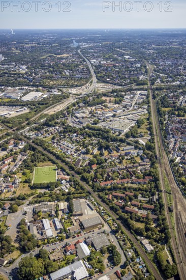 Aerial view, Herne motorway junction, new Baukau tunnel from the A43 to the A42, Wiesenstraße sports ground, Am Großmarkt industrial estate, Herne, Ruhr area, North Rhine-Westphalia, Germany, A42 motorway, A43 motorway, railway tracks, DE, Europe, distant view, commercial enterprises, commercial area, commercial area, commercial location, commercial use, industrial facilities, industrial area, industrial location, aerial view, aerial photography, aerial photography, Rhine-Ruhr metropolitan region, road traffic, overview, traffic volume, bird's eye view, birds-eyes view, overview