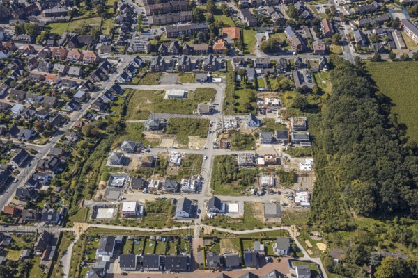 Aerial view, Schulze-Everding residential park, new construction area, Bockum-Hövel, Hamm, Ruhr area, North Rhine-Westphalia, Germany, Am Eversbach, construction work, construction vehicles, construction area, construction site, building plots, construction project, construction site, DE, development, Europe, property tax, real estate, capacity requirement, aerial view, aerial photography, aerial photography, new construction, overview, bird's-eye view, meadows and fields, housing estate, housing and living, residential area, residential buildings, housing quality, residential neighbourhood, housing estate, birds-eyes view, overview