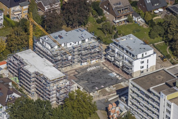 Aerial view, construction site new building at St. Josef Hospital Hamm-Bockum-Hövel, Hamm, Ruhr area, North Rhine-Westphalia, Germany, construction work, construction area, construction site, building plots, construction crane, construction measure, construction project, construction site, DE, Europe, healthcare, hospital, capacity requirement, clinic, clinic centre, hospital, aerial view, aerial photography, aerial photography, medical facility, medical aid, new building, emergency service, overview, bird's eye view, birds-eyes view, overview, medical care