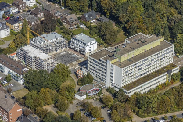 Aerial view, construction site new building at St. Josef Hospital Hamm-Bockum-Hövel, Hamm, Ruhr area, North Rhine-Westphalia, Germany, construction work, construction area, construction site, building plots, construction crane, construction measure, construction project, construction site, DE, Europe, healthcare, hospital, capacity requirement, clinic, clinic centre, hospital, aerial view, aerial photography, aerial photography, medical facility, medical aid, new building, emergency service, overview, bird's eye view, birds-eyes view, overview, medical care