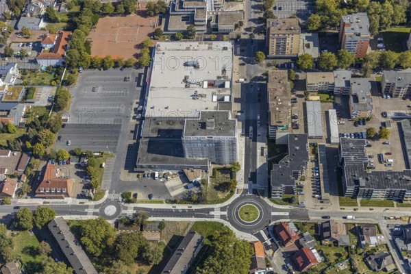 Aerial view, Rathaus-Center Bockum-Hövel, police station Bockum-Hövel, renovation of house facade, Bockum-Hövel, Hamm, Ruhr area, North Rhine-Westphalia, Germany, construction work, building, construction area, construction project, construction site, DE, shopping, shopping centres, shopping square, shopping centre, Europe, Friedrich-Ebert-Straße, roundabout, aerial view, aerial photography, aerial photography, local supply centre, renovation, redevelopment, shopping centre, overview, cladding, bird's-eye view, overview