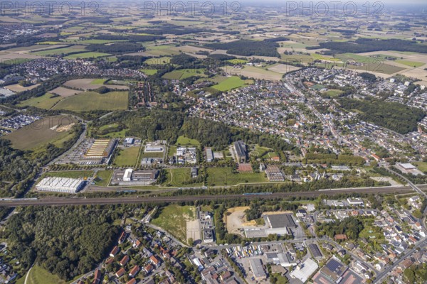 Aerial view, industrial area Sachsenweg, Hamm-Heessen, Hamm, Ruhr area, North Rhine-Westphalia, Germany, railway tracks, DE, Europe, commercial enterprises, commercial area, commercial area, commercial park, commercial location, commercial use, industrial area, industrial building, industrial location, Keolis Deutschland GmbH, aerial view, aerial photography, aerial photography, SMT Scharf AG, Sondermann-Brot Bäckerei, overview, bird's eye view, forest area, birds-eyes view, overview, Eco-Centre North Rhine-Westphalia