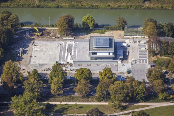 Aerial view, new construction water sports centre, construction area Adenauerallee, at Hammonense grammar school, Hamm, Ruhr area, North Rhine-Westphalia, Germany, An der Schleuse, construction work, construction, construction vehicles, construction area, construction site, building plots, construction crane, construction measure, construction project, construction site, DE, Datteln-Hamm Canal, development, Europe, canal edge, aerial view, aerial photography, aerial photography, new construction, overview, bird's eye view, water sports, birds-eyes view, overview
