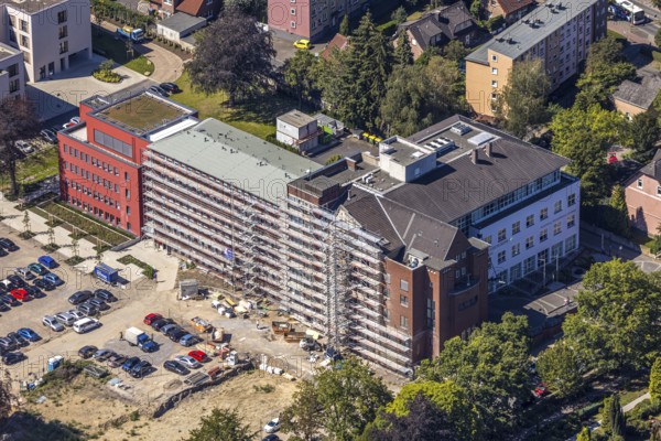 Aerial view, construction site Widumer Höfe, the future retirement home of the St. Elisabeth Group, Widumer Straße, Herne, Ruhr area, North Rhine-Westphalia, Germany, retirement home, old people's home, retirement home, place of worship, construction work, building, building area, building site, building plots, construction project, construction site, burial site, care and nursing, DE, Europe, cemetery, memorial, religious community, place of worship, house of worship, crypt, graves, burial ground, church, parish, denomination, aerial view, aerial photography, aerial photography, Rhine-Ruhr metropolitan region, new building, care facility, religion, resting place, retirement home, retirement residence, retirement home, retirement centre, overview, bird's-eye view, bird's-eye view, overview