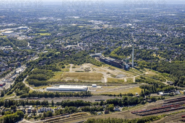 Aerial view, construction site new Stadler Schienenfahrzeuge branch, former General Blumenthal mine site, former Uniper Shamrock power plant, Herne, Ruhr area, North Rhine-Westphalia, Germany, railway tracks, DE, Europe, commercial enterprises, commercial area, commercial site, commercial use, industrial plants, industrial area, industrial site, Kastanienallee, aerial view, aerial photography, aerial photography, Rhine-Ruhr metropolitan region, overview, bird's-eye view, bird's-eye view, overview