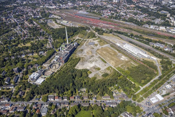 Aerial view, construction site new Stadler Schienenfahrzeuge branch, former General Blumenthal mine site, former Uniper Shamrock power plant, Herne, Ruhr area, North Rhine-Westphalia, Germany, railway tracks, DE, Europe, commercial enterprises, commercial area, commercial site, commercial use, industrial plants, industrial area, industrial site, Kastanienallee, aerial view, aerial photography, aerial photography, metropolitan region Rhine-Ruhr, signal box, overview, bird's eye view, bird's eye view, overview