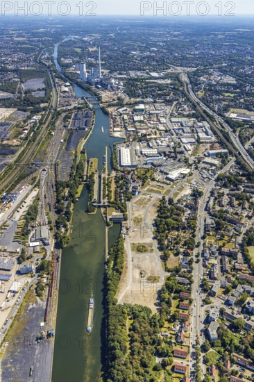 Aerial view, Hafenstraße industrial estate, Rhine-Herne Canal, Alte Schleuse Wanne-Eickel, STEAG combined heat and power plant Herne, Herne, Ruhr area, North Rhine-Westphalia, Germany, Cranger Kirmes site, DE, Europe, commercial enterprises, commercial area, industrial estate, industrial park, commercial site, commercial use, freight traffic, industrial plants, industrial area, industrial location, canal level, logistics, logistics service, logistics service provider, logistics provider, aerial view, aerial photography, aerial photography, Rhine-Ruhr metropolitan region, sight, transport, overview, bird's-eye view, overview
