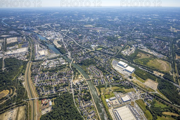 Aerial view, local view Herne, Nordfrost logistics centre, former colliery Unser Fritz, shaft 1 Malakowturm, Rhine-Herne-Canal, Herne, Ruhr area, North Rhine-Westphalia, Germany, Am Malakowturm, premises, DE, Europe, distant view, river Emscher, freight traffic, logistics, logistics service, logistics centre, aerial view, aerial photography, aerial photography, metropolitan region Rhine-Ruhr, forwarding, deep-freeze logistics centre, transport, transport service, overview, bird's-eye view, overview