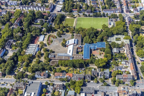 Aerial photo, comprehensive school Wanne-Eickel, sports ground Wilhelmstraße, Herne, Ruhr area, North Rhine-Westphalia, Germany, education, educational institution, DE, Europe, football pitch, football stadium, football club, comprehensive school, educational institute, aerial photo, aerial photography, aerial photography, Rhine-Ruhr metropolitan region, school, sport, sports facilities, sports ground, sports facility, stadium, overview, bird's-eye view, birds-eyes view, overview