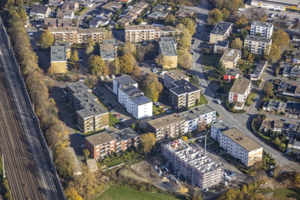 Aerial view, residential buildings construction site Röntgenstraße, Pelkum, Hamm, Ruhr area, North Rhine-Westphalia, Germany, construction work, construction, construction area, building site, building plots, construction project, construction site, DE, Europe, property tax, high-rise buildings, real estate, aerial photography, aerial photography, aerial photography, apartment buildings, new construction, photovoltaic, photovoltaic system, solar, solar system, solar energy, solar energy, overview, bird's-eye view, housing estate, housing and living, residential area, residential buildings, housing quality, housing estate, birds-eyes view, overview
