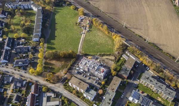 Aerial view, residential buildings construction site Röntgenstraße, Pelkum, Hamm, Ruhr area, North Rhine-Westphalia, Germany, construction work, construction, construction area, construction site, building plots, construction project, construction site, DE, Europe, property tax, high-rise buildings, real estate, aerial view, aerial photography, aerial photography, multi-family houses, new construction, overview, bird's eye view, residential complex, living and living, residential area, residential buildings, residential quality, housing estate, birds-eyes view, overview