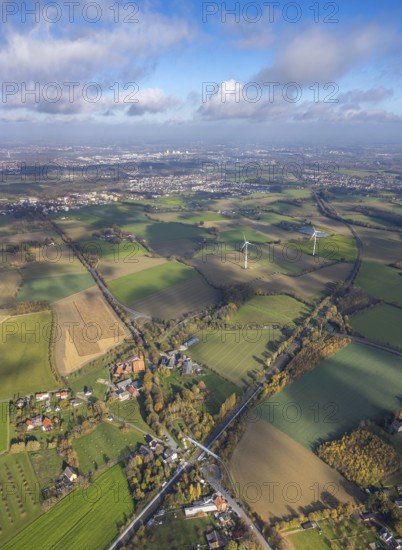Aerial view, Bönen-Nordbögge railway station, view to Pelkum, Pelkum, Hamm, Ruhr area, North Rhine-Westphalia, Germany, railway tracks, railway station, bridge, DE, Deutsche Bahn AG, Europe, distant view, pedestrian bridge, main station, aerial view, aerial photography, aerial photography, overview, bird's-eye view, wind energy, wind energy plant, wind power, wind power plant, wind turbines, birds-eyes view, overview