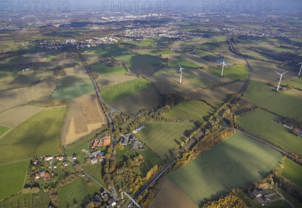 Aerial view, Bönen-Nordbögge railway station, view to Pelkum, Pelkum, Hamm, Ruhr area, North Rhine-Westphalia, Germany, railway tracks, railway station, bridge, DE, Deutsche Bahn AG, Europe, distant view, pedestrian bridge, main station, aerial view, aerial photography, aerial photography, overview, bird's-eye view, wind energy, wind energy plant, wind power, wind power plant, wind turbines, birds-eyes view, overview