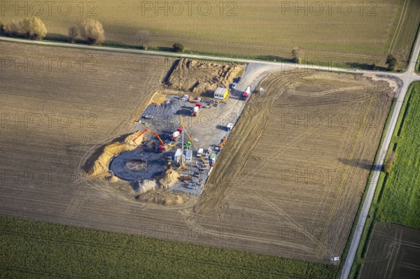 Aerial photo, construction site for wind turbines, Hellweg, near the A2 motorway, Rhynern, Hamm, Ruhr area, North Rhine-Westphalia, Germany, construction work, construction, construction area, construction site, construction site, construction project, construction site, DE, Europe, aerial photo, aerial photography, aerial photography, new construction, overview, bird's eye view, WTG, meadows and fields, wind energy, wind turbine, wind power, wind turbine, wind turbines, bird's eye view, overview