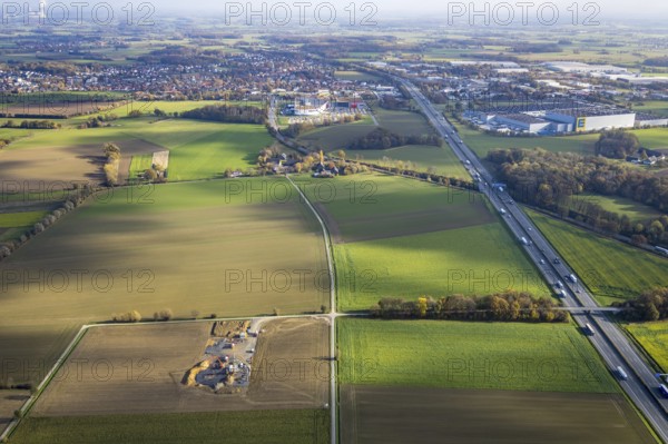 Aerial view, construction site for wind turbines, Hellweg, near the A2 motorway, Rhynern, Hamm, Ruhr area, North Rhine-Westphalia, Germany, A2 motorway, construction work, construction, construction area, building site, building plots, construction project, construction site, DE, Europe, distant view, aerial view, aerial photography, aerial photography, new construction, overview, bird's-eye view, wind turbines, meadows and fields, wind energy, wind turbine, wind power, wind turbine, wind turbines, bird's-eye view, overview