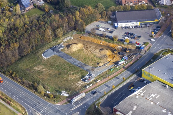 Aerial view, construction area for Galerie Mensing at the intersection of Werler Straße and Unnaer Straße, Hamm, Ruhr area, North Rhine-Westphalia, Germany, construction work, construction, construction area, building site, building plots, construction project, construction site, DE, Europe, commercial enterprises, commercial area, commercial area, commercial location, commercial use, aerial view, aerial photography, aerial photography, new construction, overview, bird's-eye view, overview
