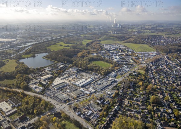 Aerial view, commercial area Hammer Straße, Radbodsee, Bockum-Hövel, Hamm, Ruhr area, North Rhine-Westphalia, Germany, An den Fördertürmen, DE, Europe, commercial enterprises, commercial area, commercial park, commercial location, commercial use, industrial area, industrial building, industrial location, aerial photograph, aerial photography, aerial photography, sports field, overview, bird's-eye view, W. Potthoff Vokswagen Vertrieb, birds-eyes view, overview