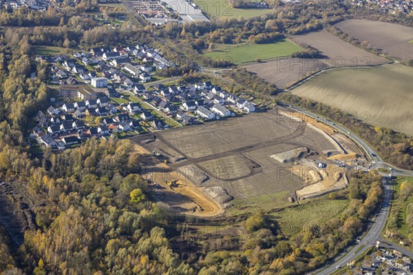 Aerial view, construction area at Sachsenring, roundabout, housing estate, Heessen, Hamm, Ruhr area, North Rhine-Westphalia, Germany, construction work, construction, construction area, building site, building plots, construction project, construction site, DE, Europe, property tax, real estate, roundabout, aerial view, aerial photography, aerial photography, new construction, overview, bird's eye view, residential complex, living and living, residential area, residential buildings, residential quality, residential area, birds-eyes view, overview