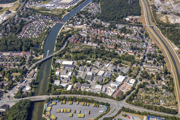 Aerial view, Resser Straße industrial estate, Dannekamp e.V. Allotment garden association, residential area Im Emscherbruch, Rhine-Herne canal, river Emscher, Herne, Ruhr area, North Rhine-Westphalia, Germany, bridge, bridge Dorstener Straße, DE, Europe, community garden, commercial enterprises, commercial area, commercial area, commercial use, property tax, real estate, industrial plants, industrial area, industrial site, KGV, allotment garden, allotment garden site, allotment garden association, allotment garden association Wanne Nord, allotment garden association, aerial view, aerial photography, aerial photography, metropolitan region Rhine-Ruhr, Papageienbrücke - Unser Fritz, allotment garden, overview, bird's-eye view, residential area, housing and living, residential area, residential buildings, quality of living, residential neighbourhood, housing estate, birds-eyes view, overview